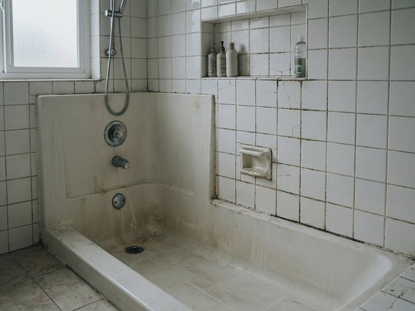 Dated shower surround before re-tile, example