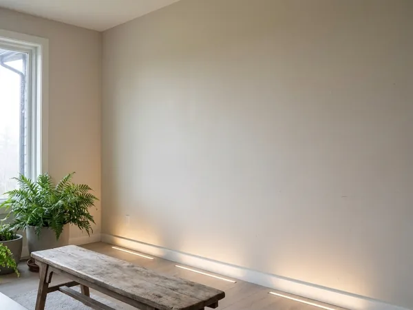 Plain accent wall before stone tile, example